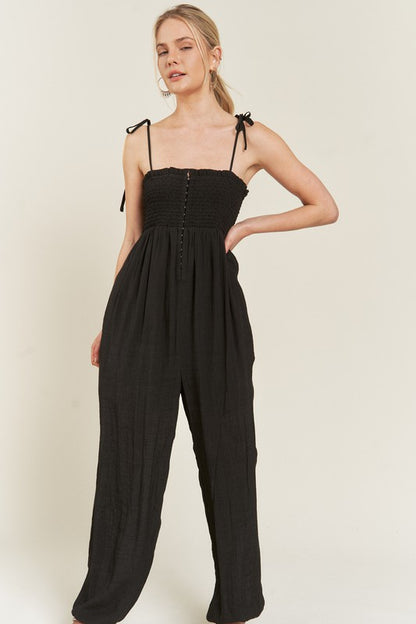 SMOCKED TIE STRAP JUMPSUIT